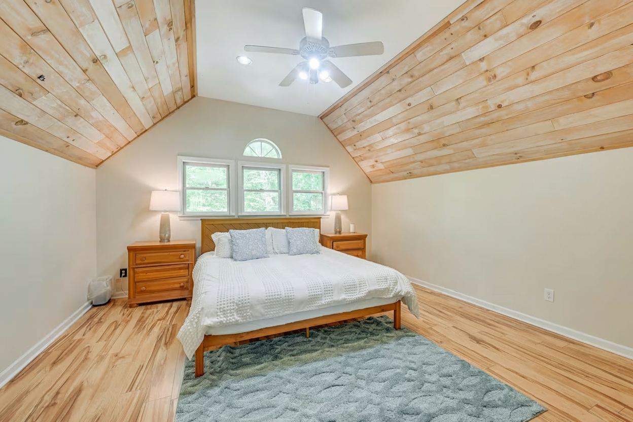Spacious king bedroom in Smoky Mountains cabin that sleeps 15 guests